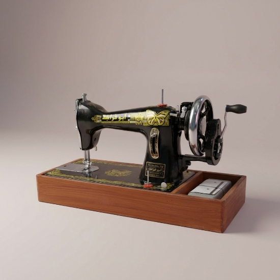 صورة مكينة خياطة يدوية